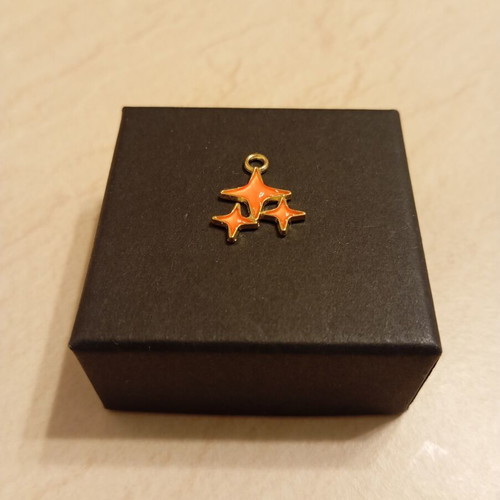 Pendant with star design, gold plated, new