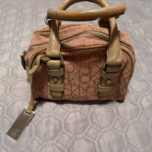 Calvin Klein pink handbag used with worn leather repairable