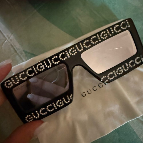 Gucci sunglasses used, black with missing rhinestones