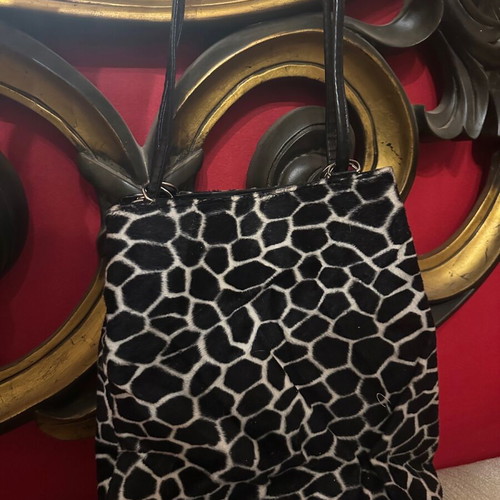Shoulder bag used with black and white giraffe animal print