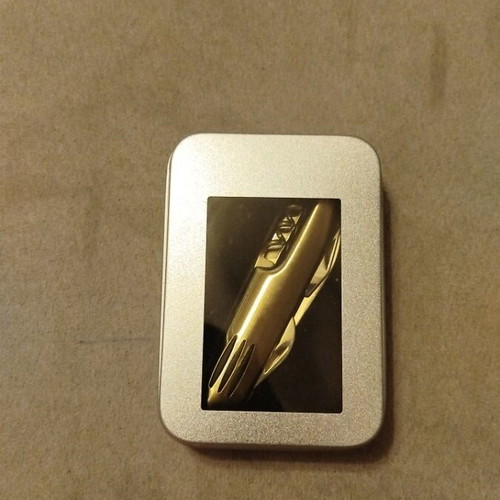Pocket knife new in metal box unused