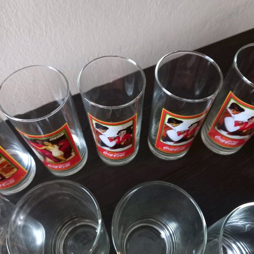 Coca-Cola set of 14 vintage promotional glasses new, 4 designs