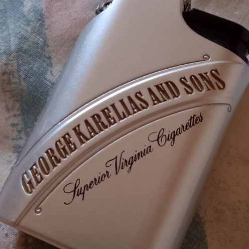 George Karelias & Sons metal lighter new, Superior Virginia Cigarettes