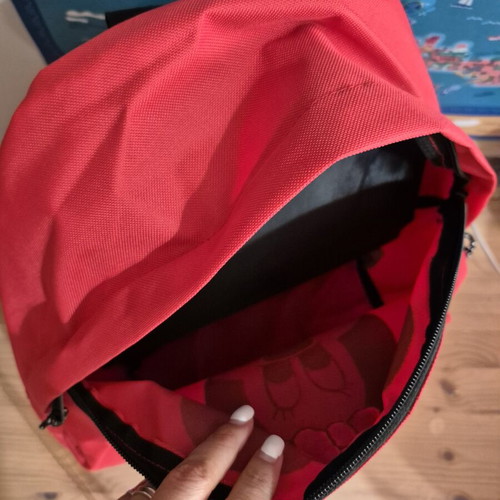 Hand-painted red backpack with Minnie Mouse design