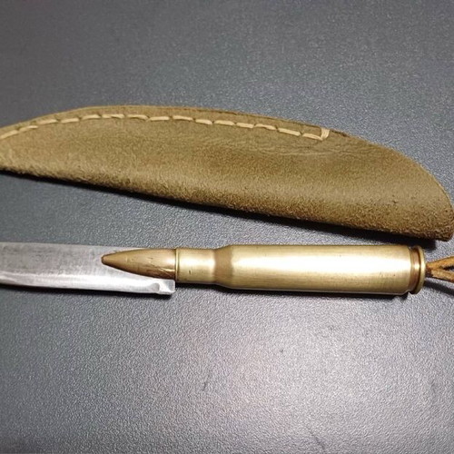 Handmade knife like new with leather sheath and spring blade
