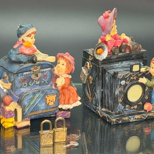 Vintage polyresin piggy banks with three locks and working key
