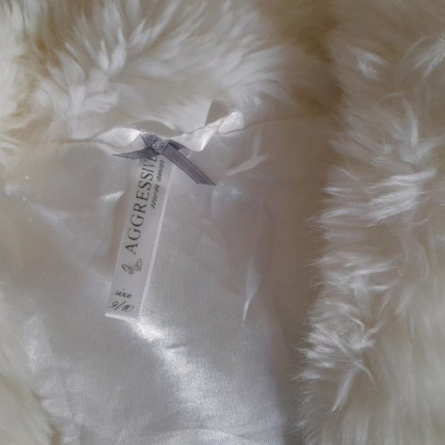 Polyester fur 100% like new for 9 to 10 years old