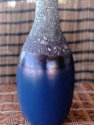 Blue vase with design