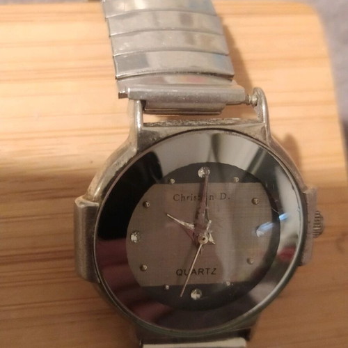 Women's watch used with elastic grey silver bracelet