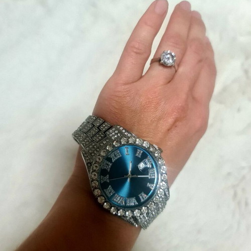 Quartz watch new with large dial and sparkling artificial diamonds