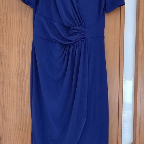 Blue elegant dress with short sleeves and wrap design