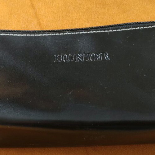 Hunter bag used, black with white stitching