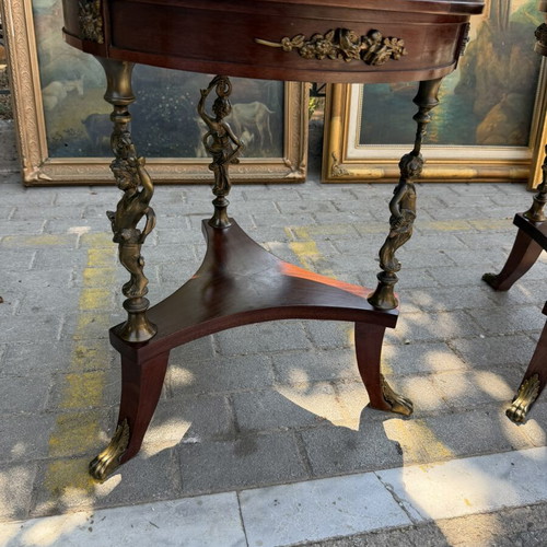 French coffee tables like new with bronze cherubs and lion paw legs, pair