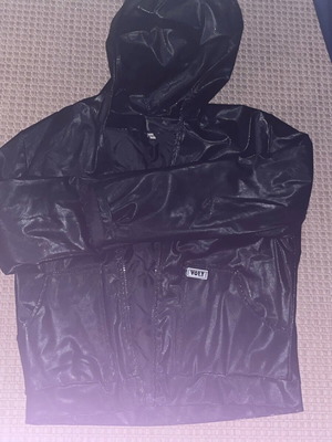 Vintage black jacket Volcano like new with wear on left sleeve