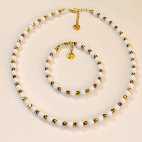 Jewelry set new with white and gold stones necklace and bracelet