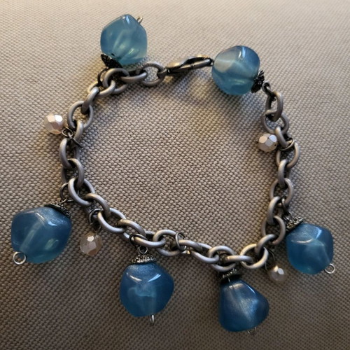 Bracelet in silver tone with blue stones used