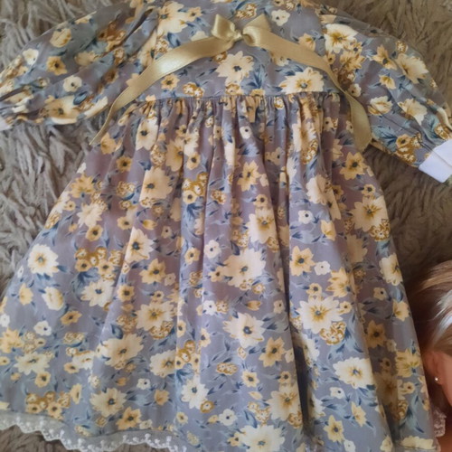 Nancy Famosa doll 2010 with 3 vintage dresses