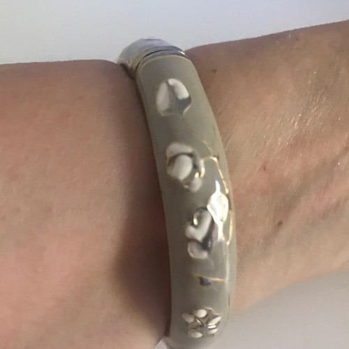 Women's embossed bangle bracelet used, beige with white and gold