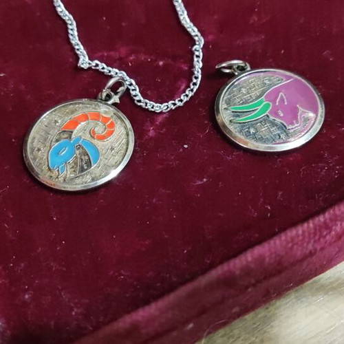 Zodiac Aries and Taurus enamel necklace set like new