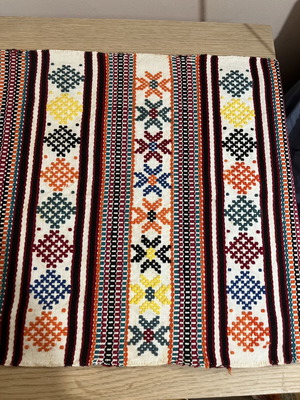 Vintage traditional woven table runner with fringes and geometric motifs, like new