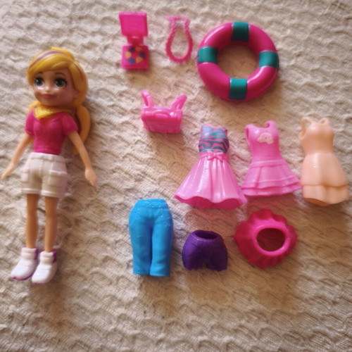 Polly Pocket doll with original clothes and shoes, used