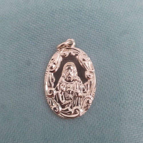 Christian pendant from the 70s, new, gold-colored metal