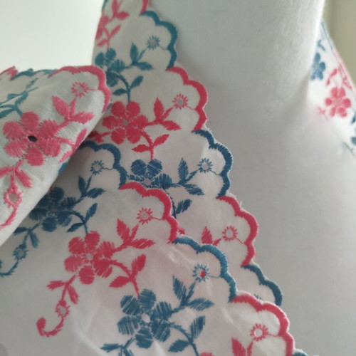 Cotton machine lace with pink and blue flowers