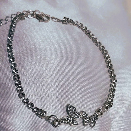 Bracelet with shiny butterflies new, white and silver