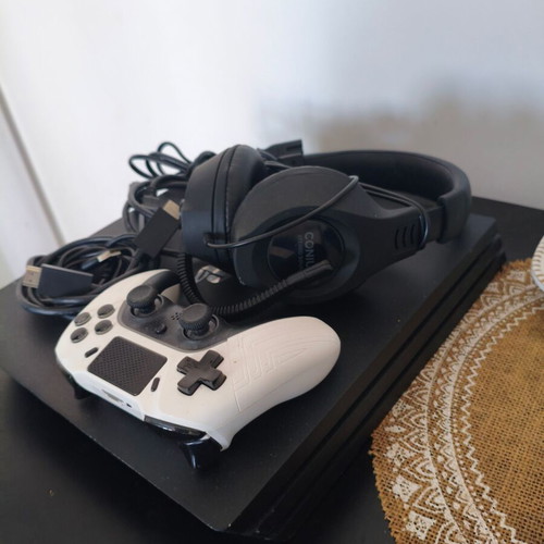 PlayStation 4 Pro 1TB like new with headset and extra controller