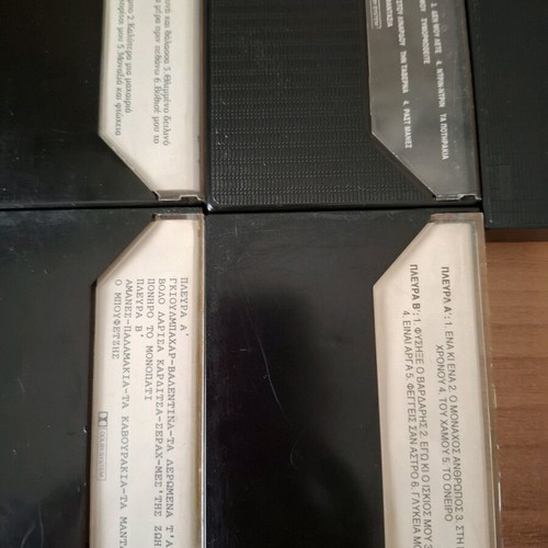 Cassette tapes used with Greek and foreign music, many