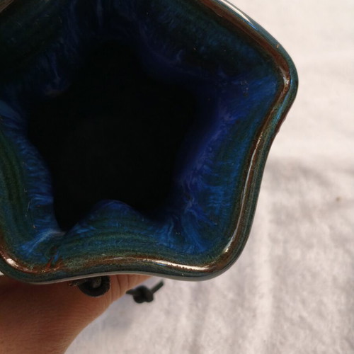 Handmade ceramic vase with blue drip glaze