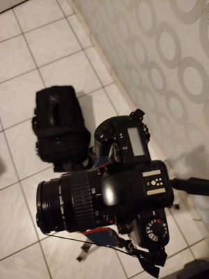 Canon EOS 500 camera with 35-80mm lens, tripod and waterproof bag like new