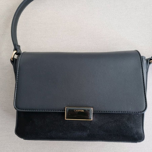 Carpisa black crossbody bag used with magnetic clasp