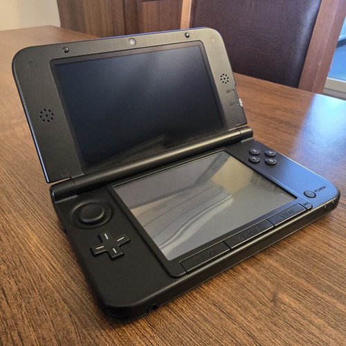 Nintendo 3DS XL unlocked used with 64GB SD card and charger