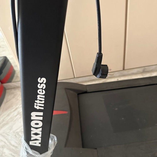 Axxon Fitness electric treadmill with digital display