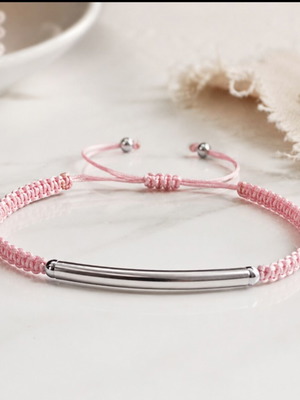 Macrame bracelet with silver steel element, pink cord