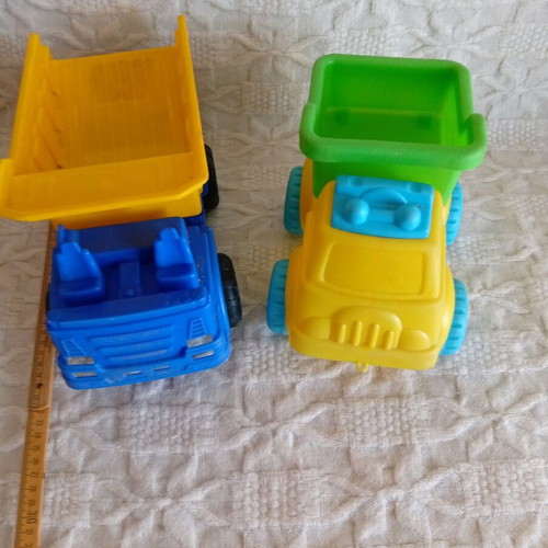 Plastic toy dump trucks used for children