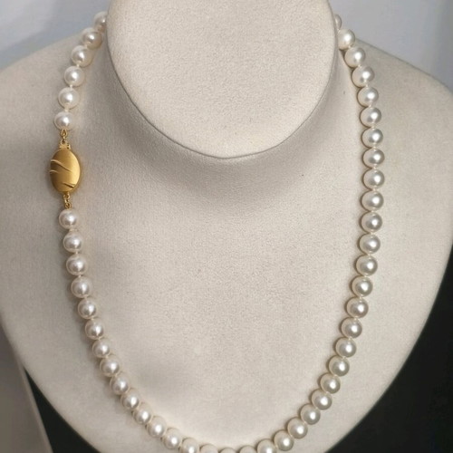 Pearl necklace new with 14K gold clasp