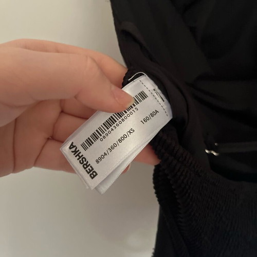 Bershka black bodysuit with open back like new, size XS