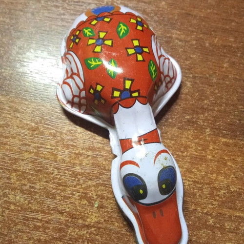 Tin toy replicas used, decorative frog figures
