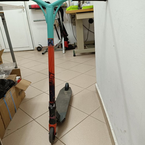 BMX stunt scooter used with scratched bottom