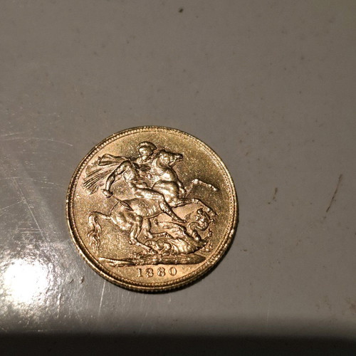 Collectible gold English sovereign Queen Victoria 1880 and 1890 like new