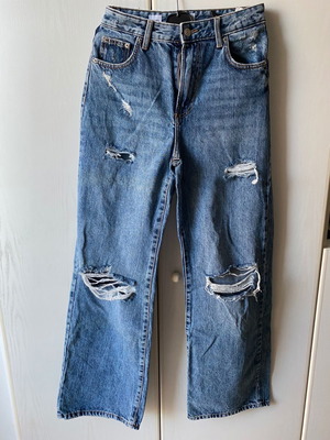 High waisted Bershka jeans used, size 36, with rips