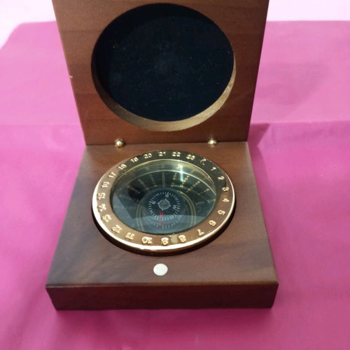 Compass made of wood and bronze used with calendar until 2046
