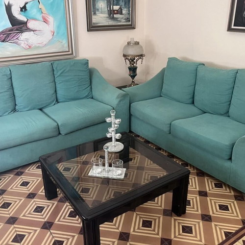 Living room set with 2 fabric sofas and 3 coffee tables used