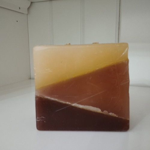 Handmade decorative candle used with layered minimal design