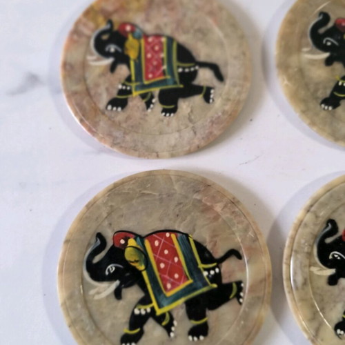Marble coasters used with elephant painting from India