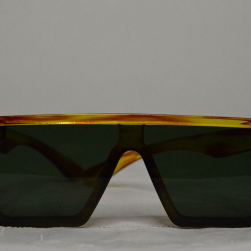 Square sunglasses used yellow and green