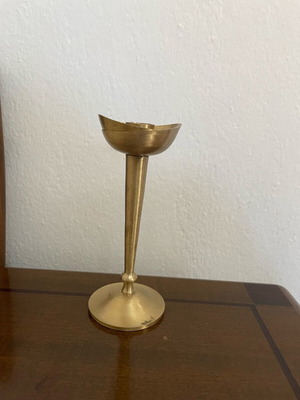 Vintage brass candlestick used with minimal design