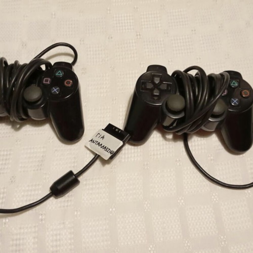 Sony PlayStation 2 Slim like new with cables and controllers